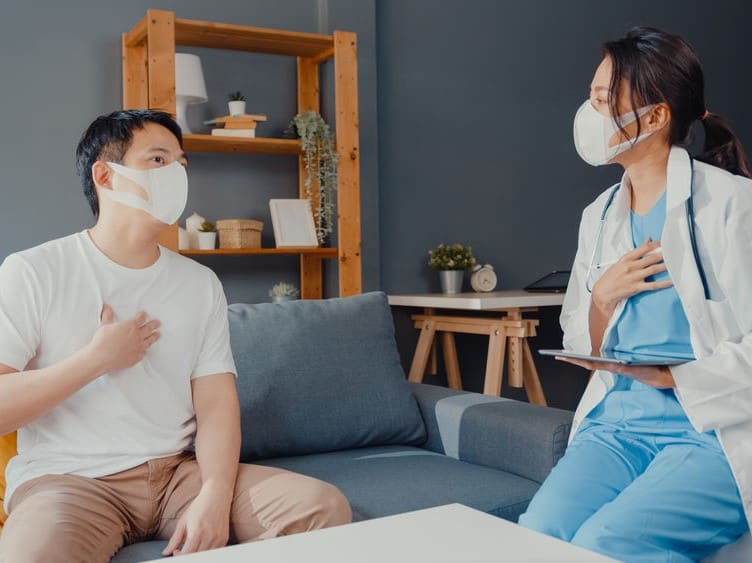 young asian doctor with patient