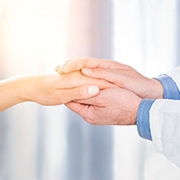 doctor patient care holding human hand trust touch medical thanks help clinic health concept - stock image