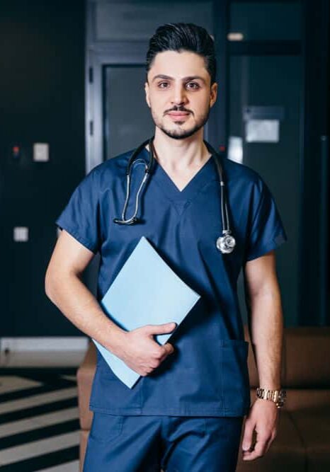 Doctor standing in room